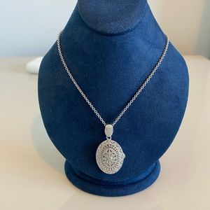 Diamond vintage style oval locket in sterling silver.